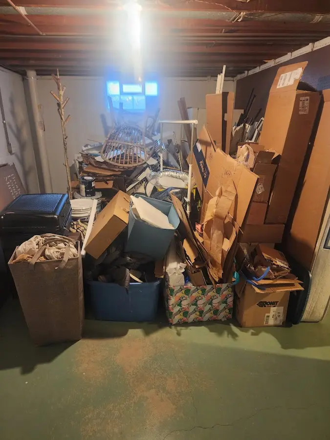 Roll-off dumpster container at job site for 2 Yard Dumpster Rental in Kula